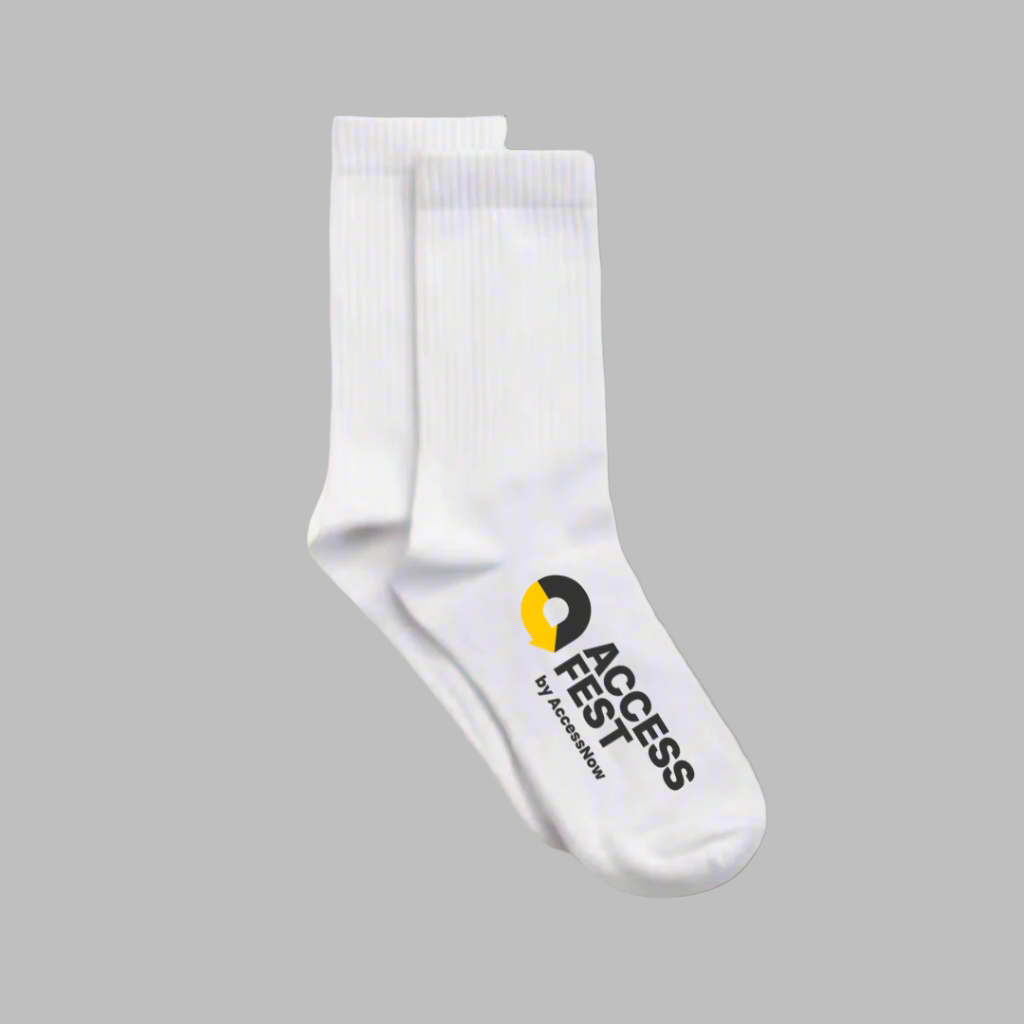 White sock with AccessFest by AccessNow logo in black and yellow on a grey background 
